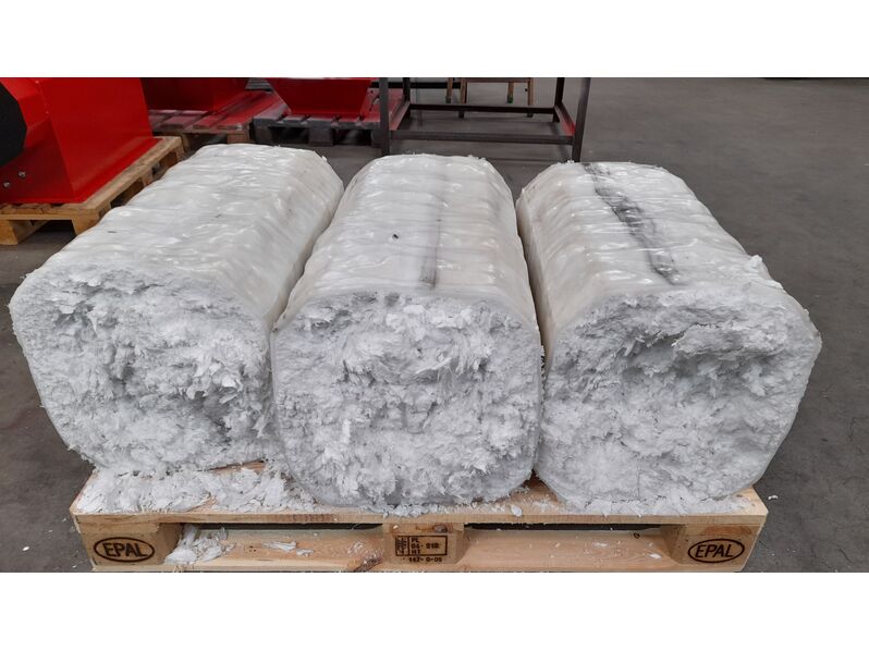 Blocks of compacted EPE on a pallet. 